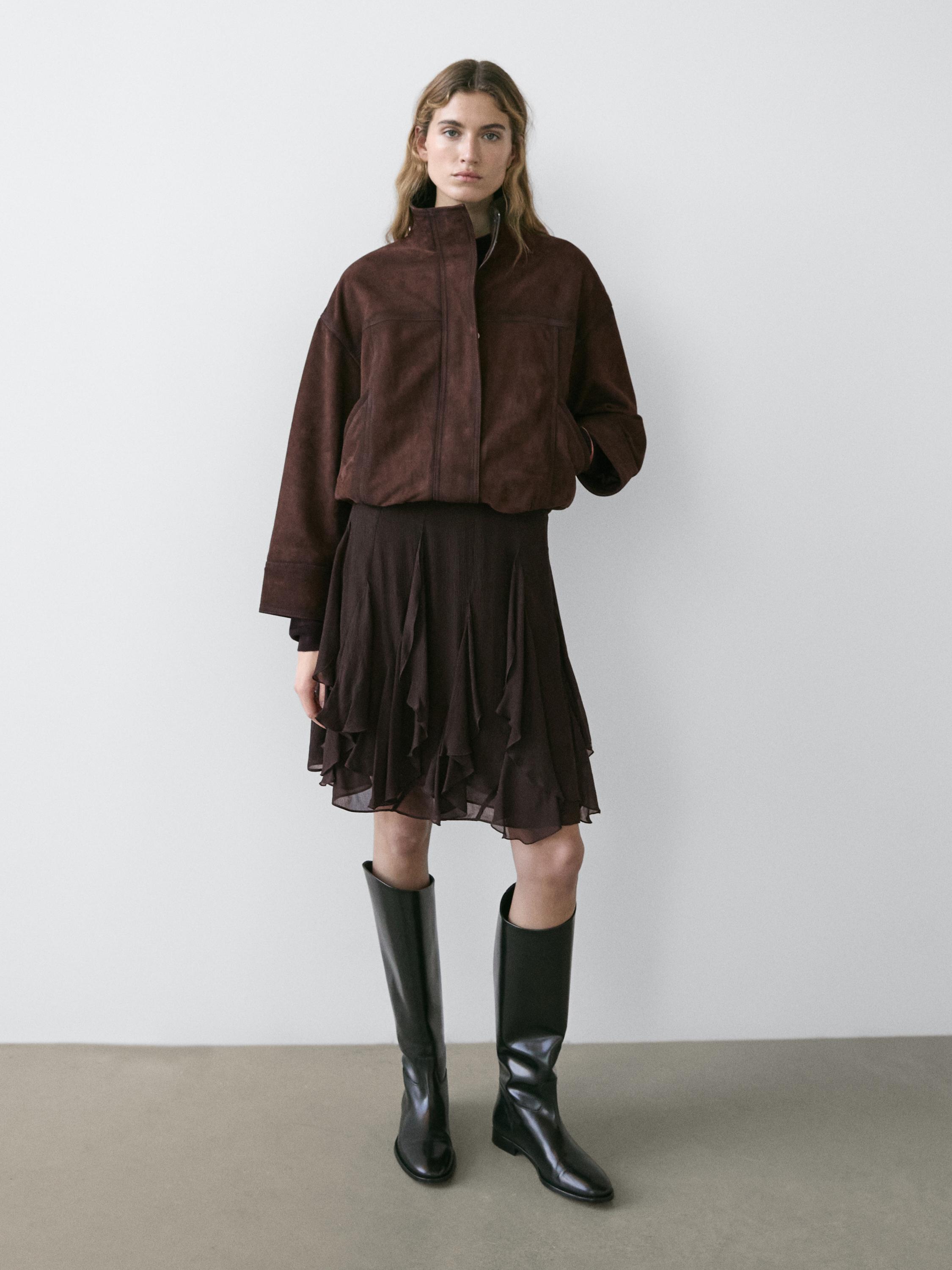 Asymmetric skirt with ruffles