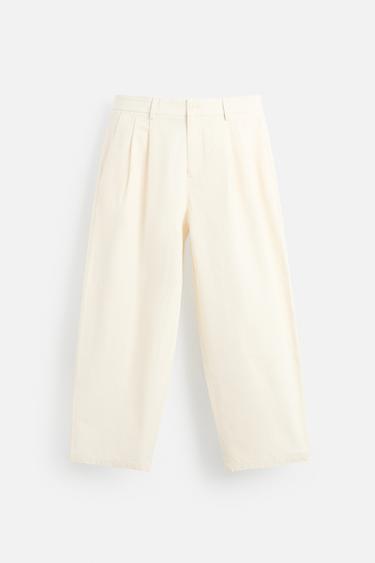 PLEATED CHINO TROUSERS - Ecru by Zara