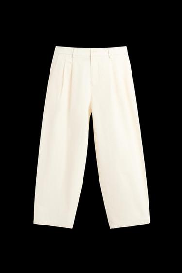 PANTALÓN CHINO PLIEGUES - Crudo de Zara - Imagen 0