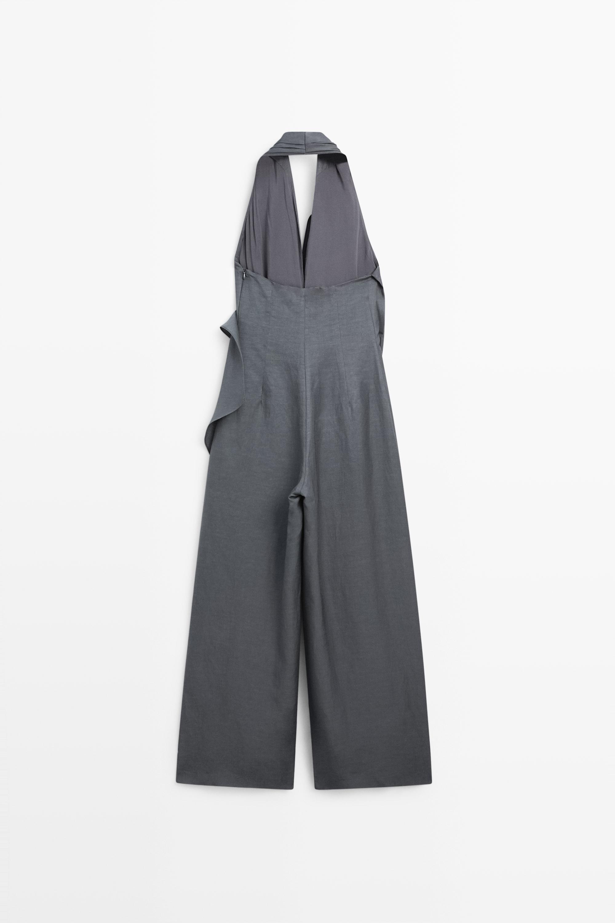 Asymmetric draped jumpsuit
