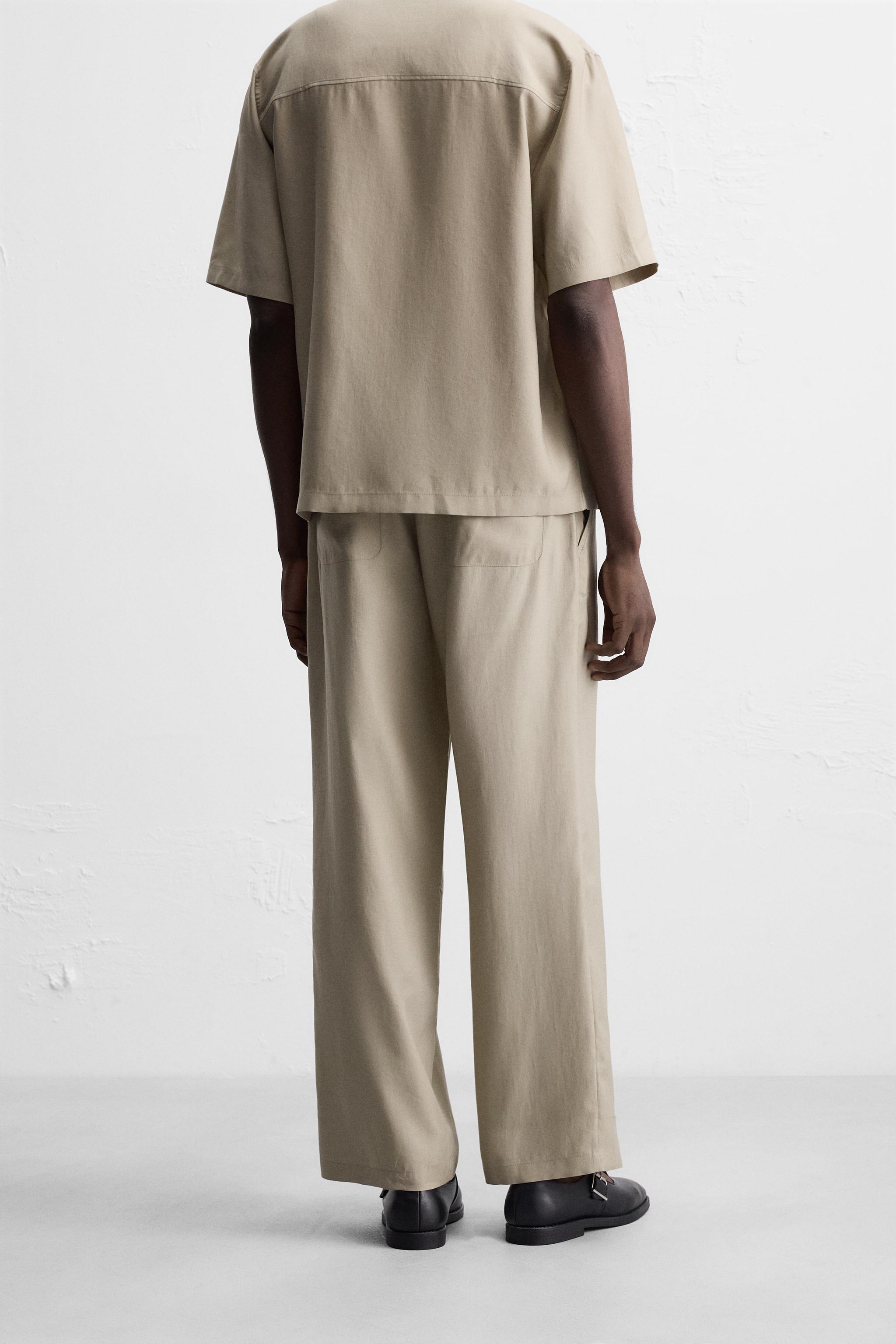 RELAXED FIT FLOWY PANTS