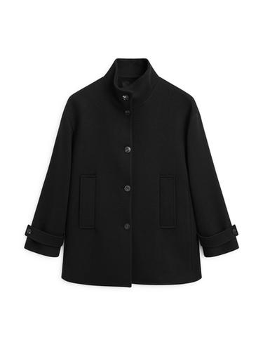 Manteau boutonné à col montant en laine mélangée - Noir de Zara