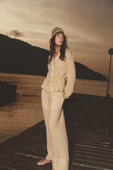 PANTALÓN ANCHO SEMITRANSPARENTE EFECTO ARRUGADO - Beige claro de Zara