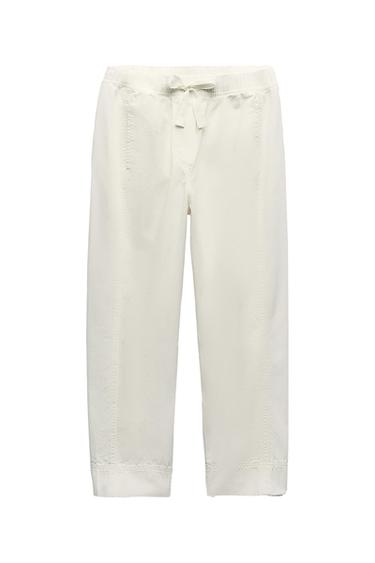 CARROT-FIT TROUSERS WITH ELASTICATED WAIST