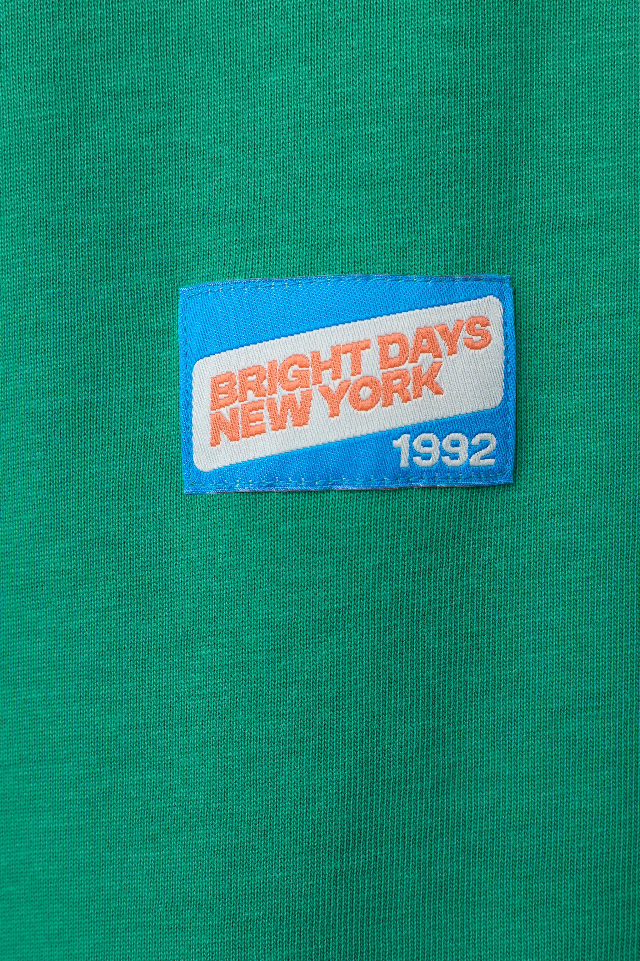 EMBROIDERED TEXT PATCH T-SHIRT