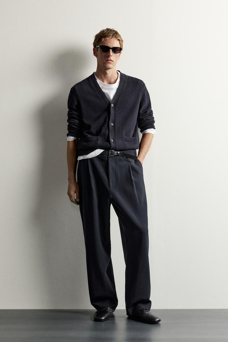 RELAXED FIT PLEATED TROUSERS