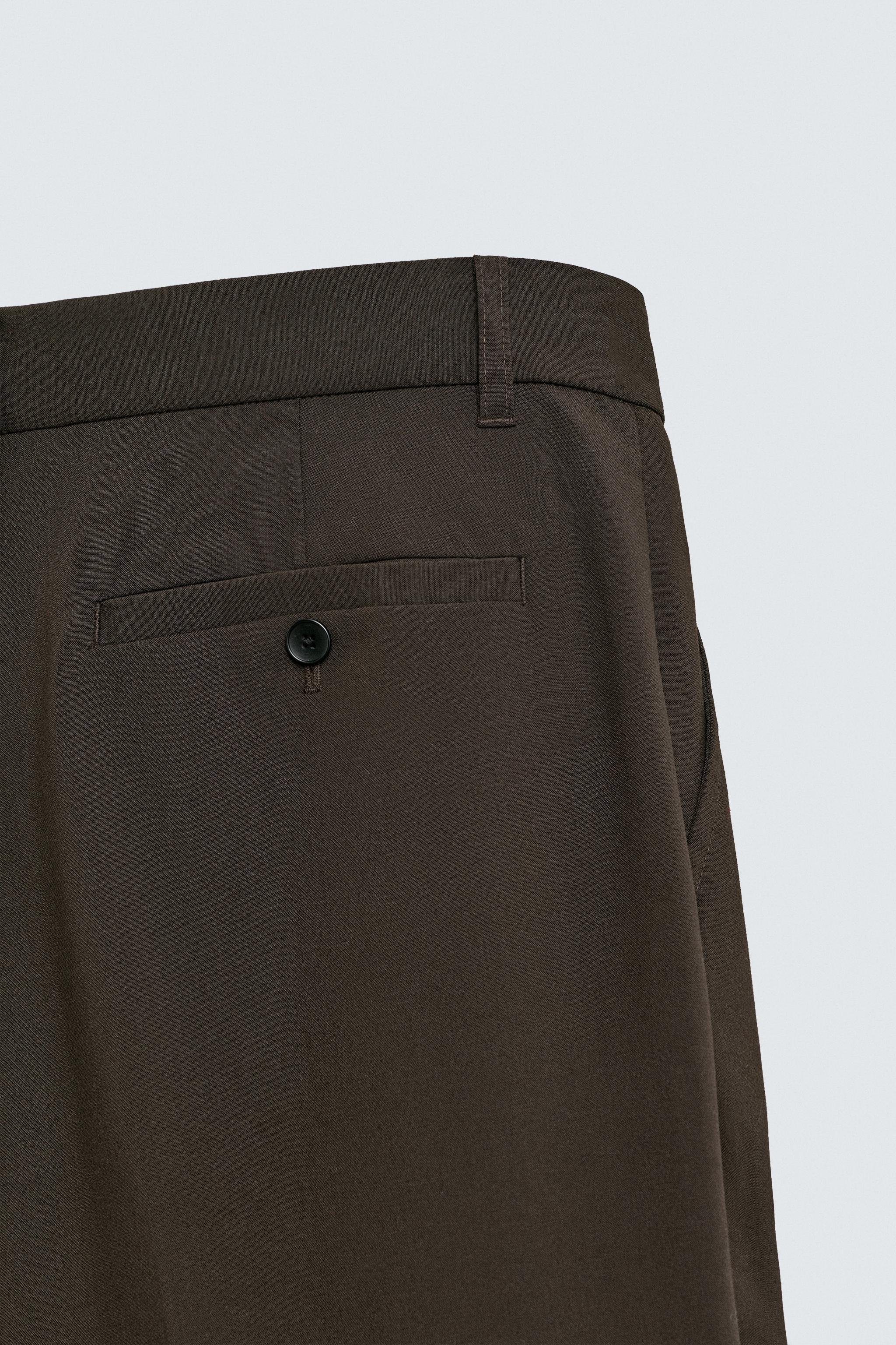 PANTALON COUPE LARGE À PLIS
