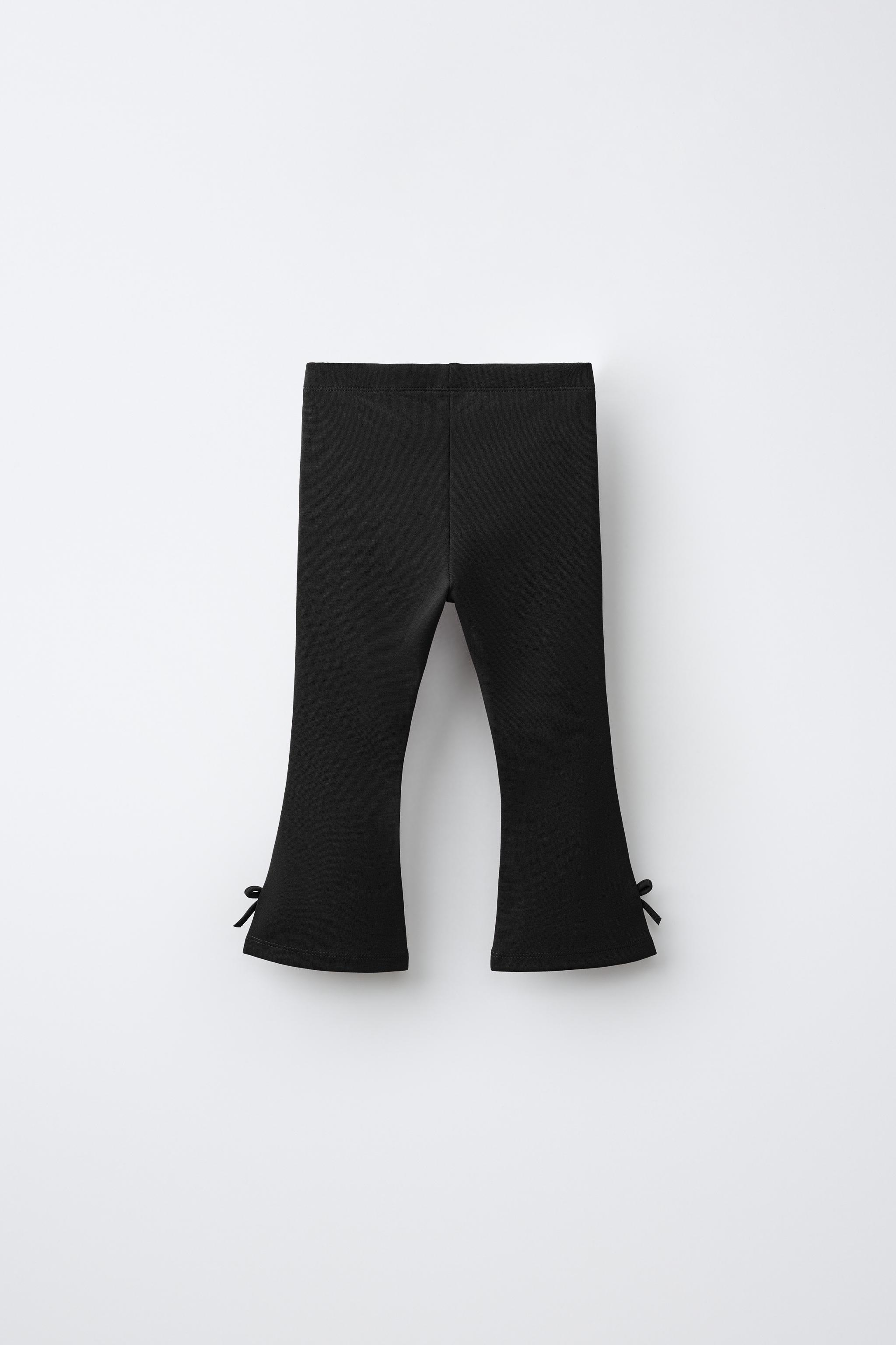 PUNTO ROMA FLARE LEGGINGS WITH BOWS — Black