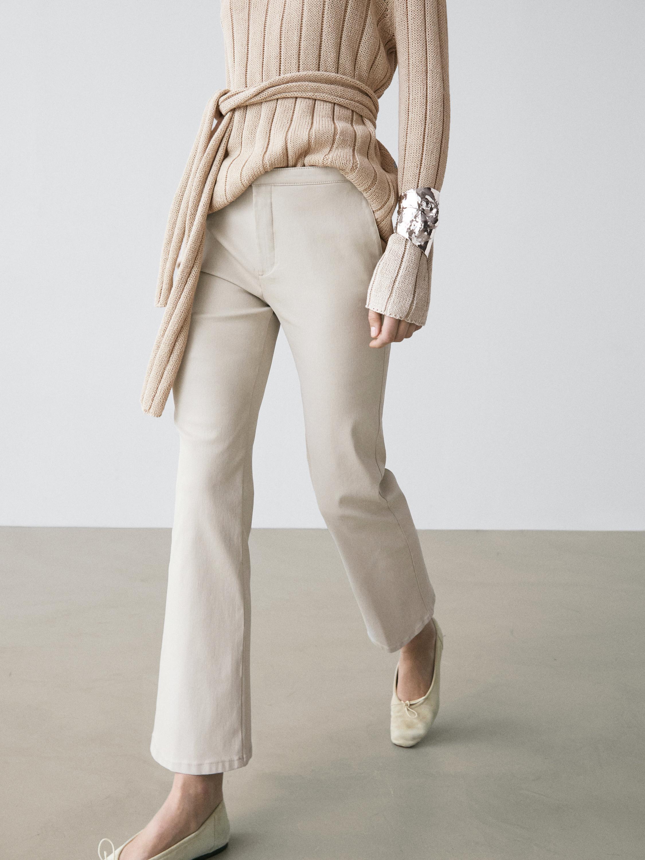 Mid-waist waxed flared pants