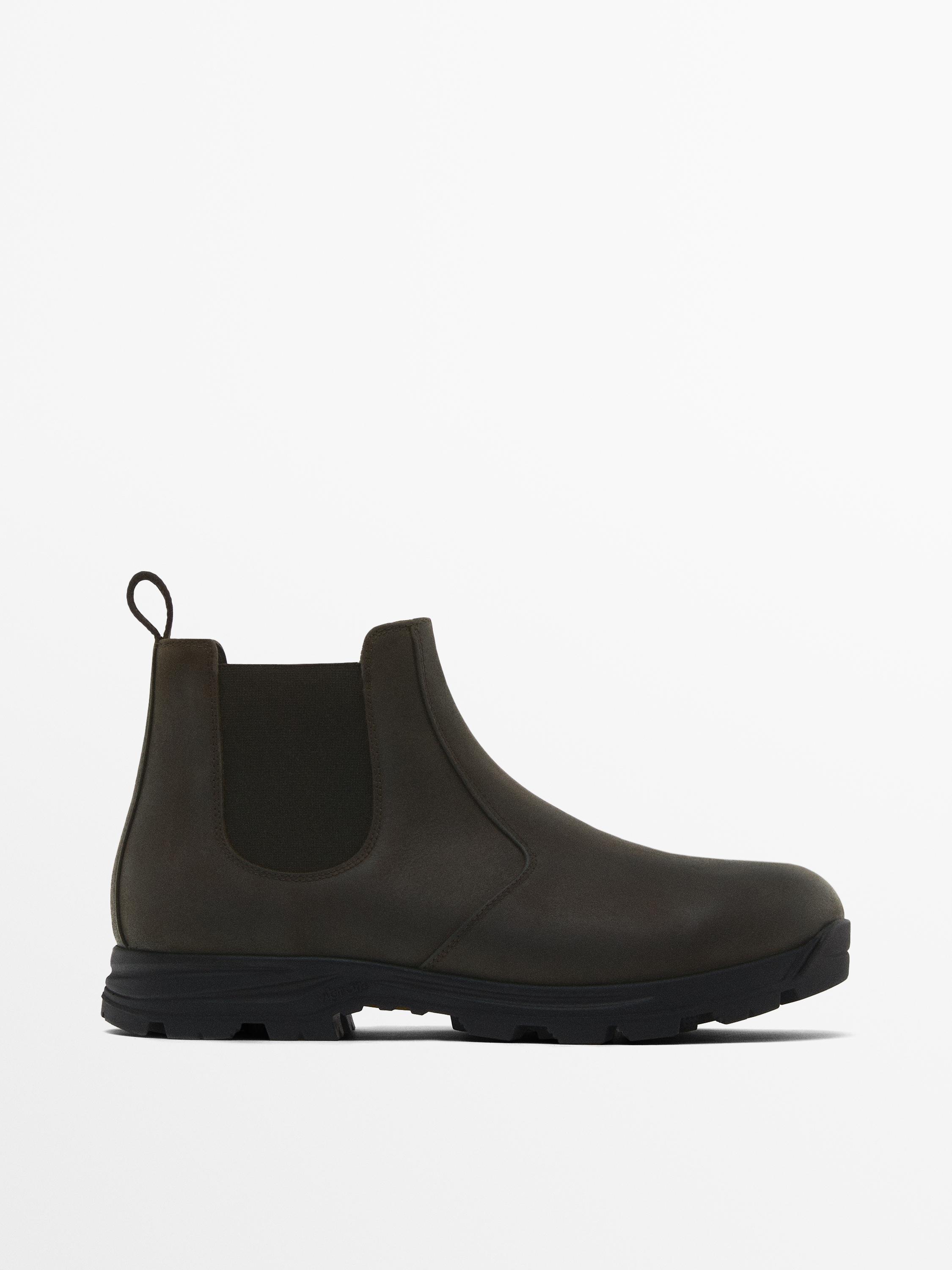 Leather sock ankle boots with vibram detail