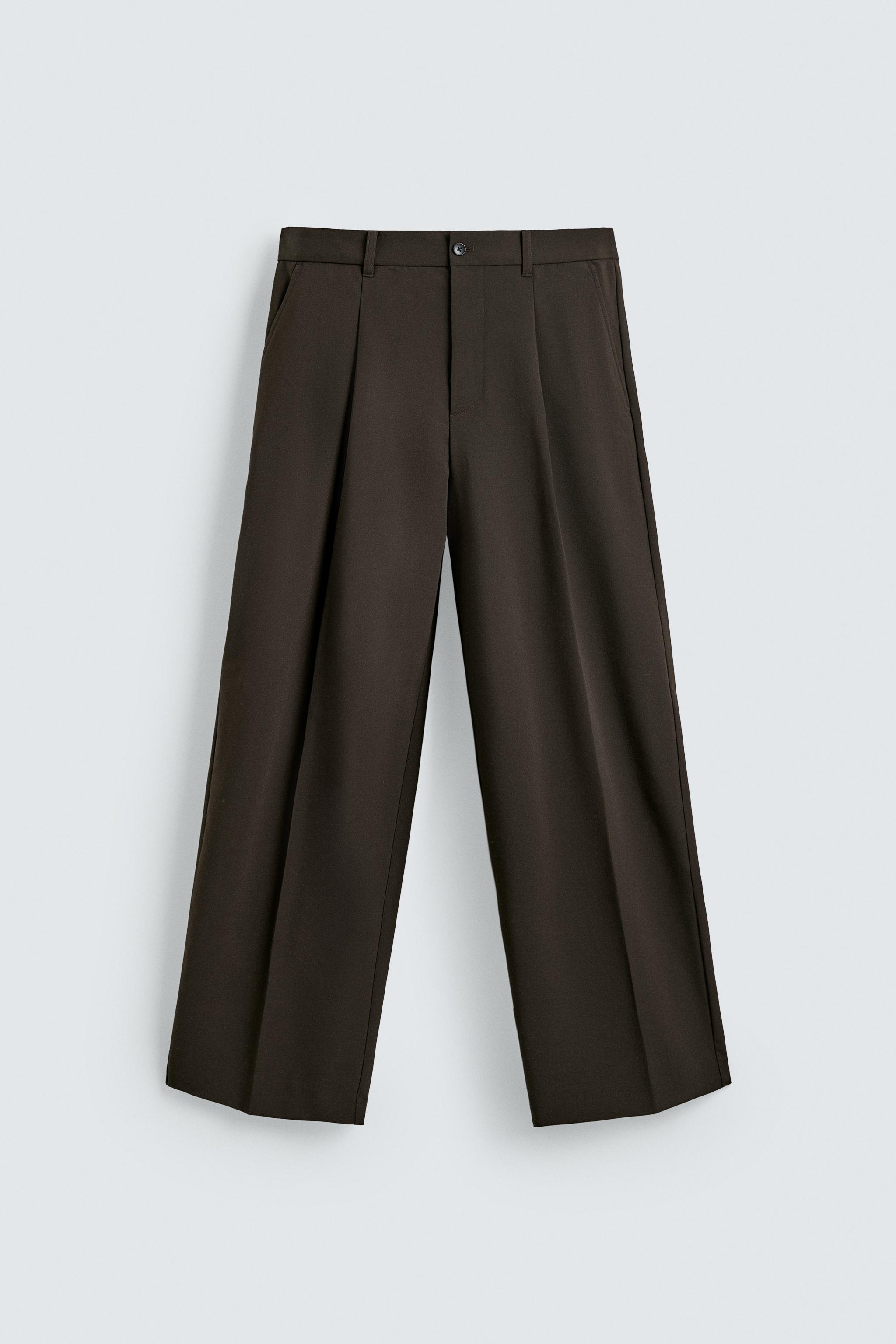 PANTALON COUPE LARGE À PLIS