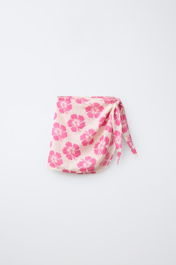 Zaras HIBISKUSMÖNSTRAD SARONG MED DEKORPÄRLOR - Fuchsia - Bild 0