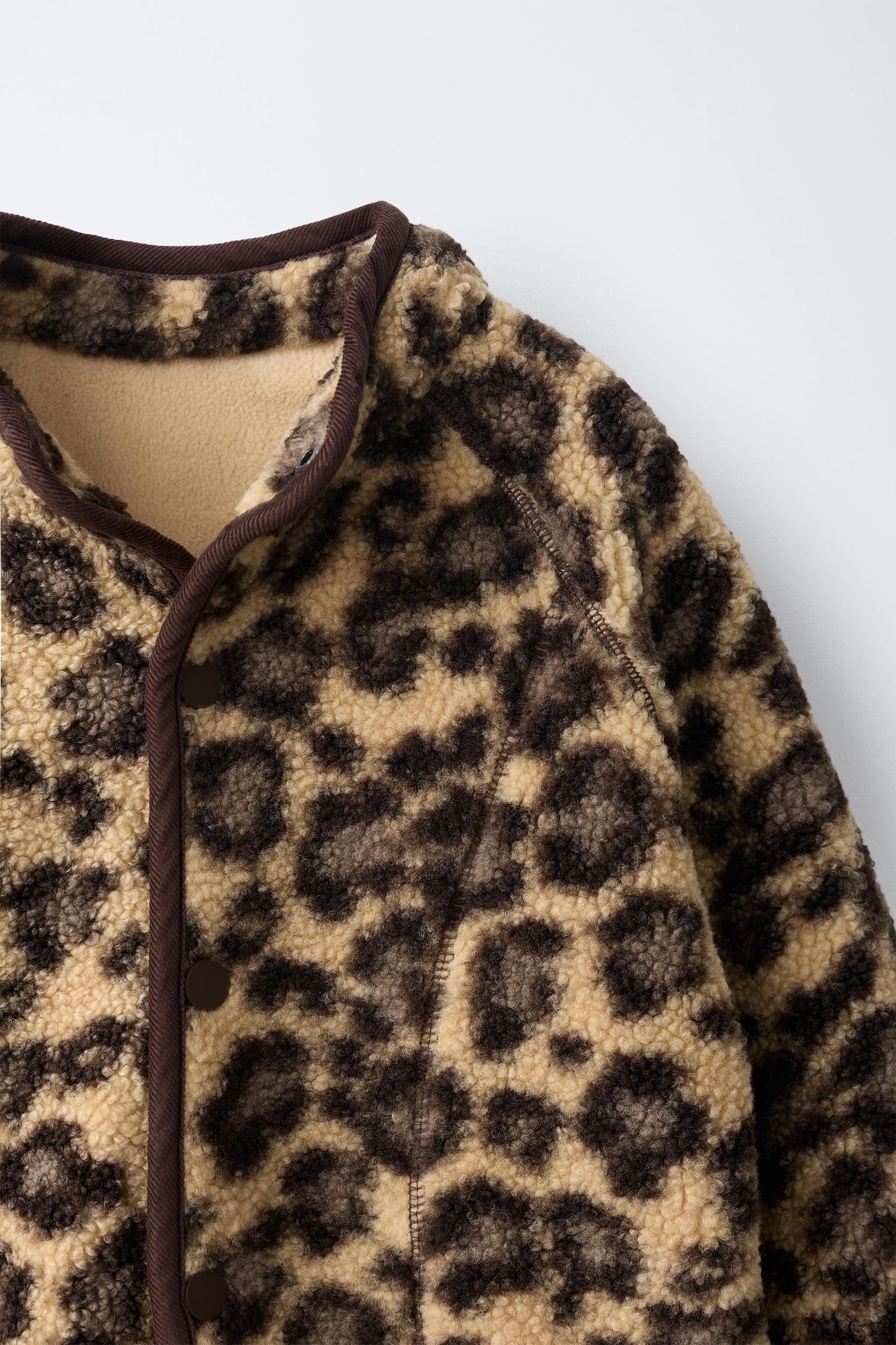BLOUSON ANIMAL PRINT EN BORREGUILLO