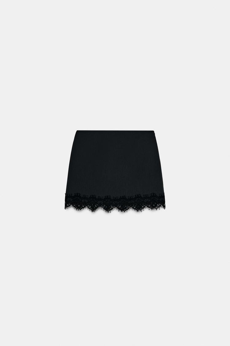 FALDA PANTALÓN CON DObladillo DE ENCAJE 8