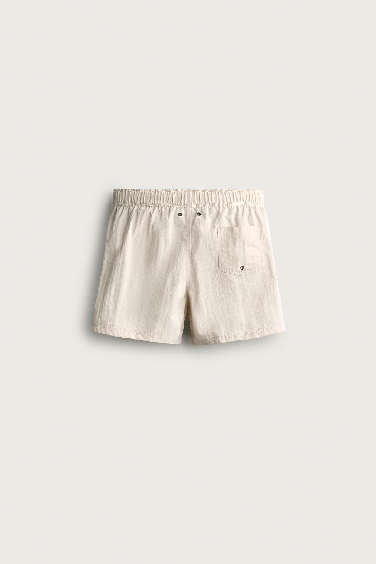 TEXTURED MID-LENGTH SWIM SHORTS — Ecru