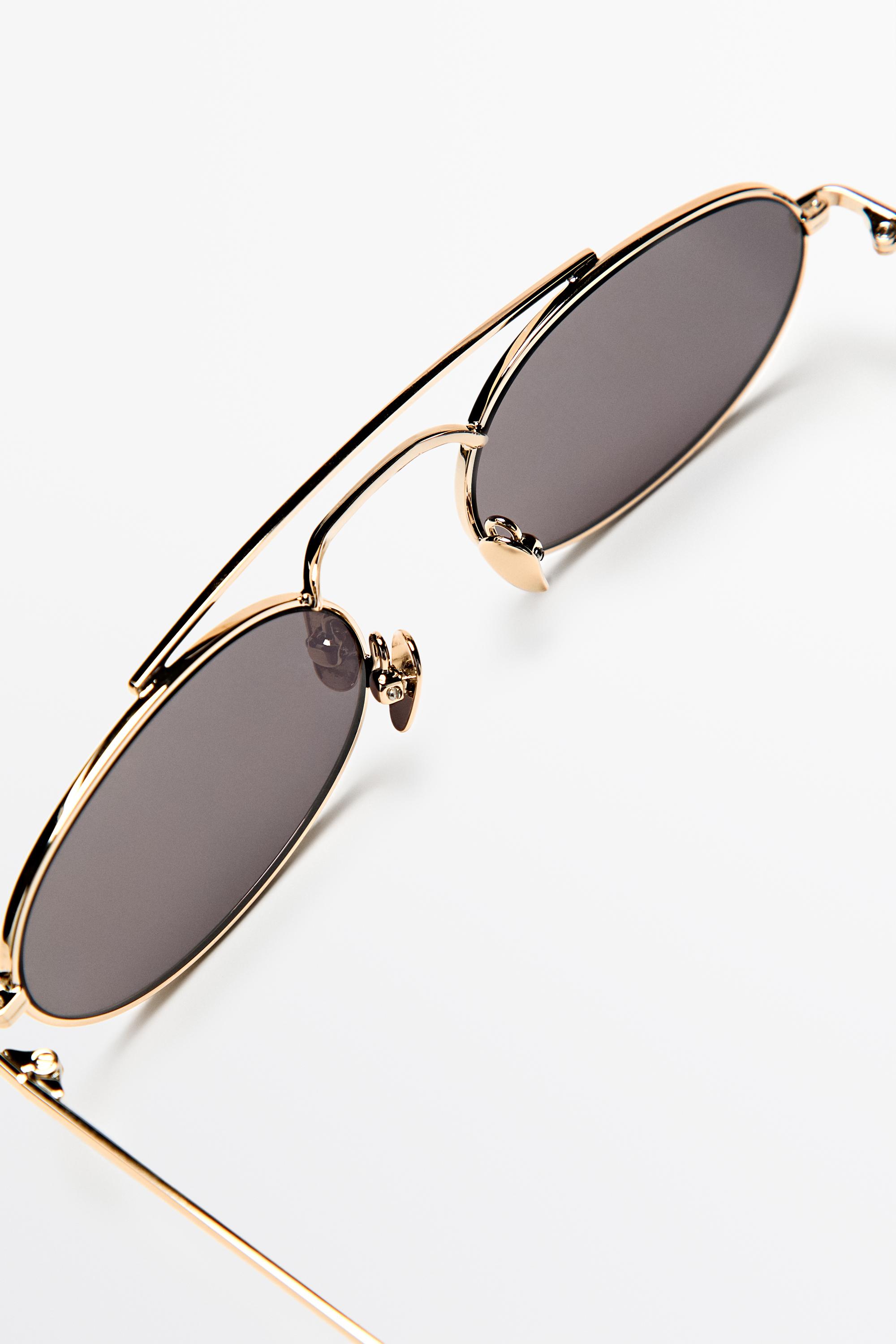 Double bridge oval sunglasses
