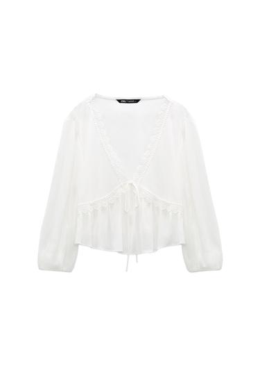 FLOWING BLOUSE WITH MATCHING DETAIL