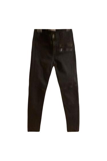 JEANS NEGROS CON CREMALLERAS Y RODILLERA PESPUNTEADA