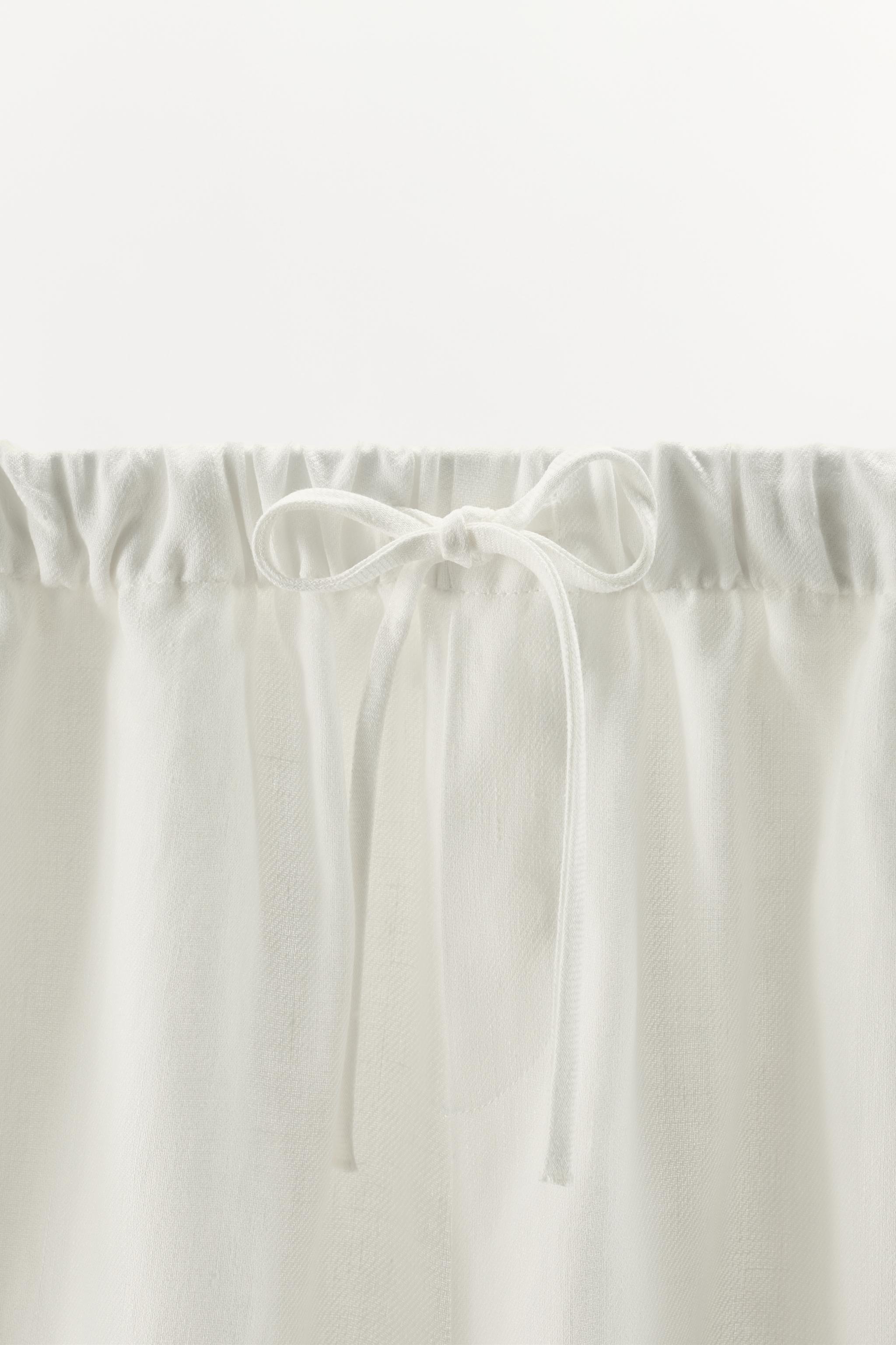 LINEN DRAWSTRING BERMUDA SHORTS