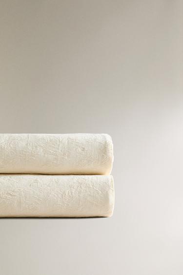 COLCHA JACQUARD FLOR - Crudo de Zara