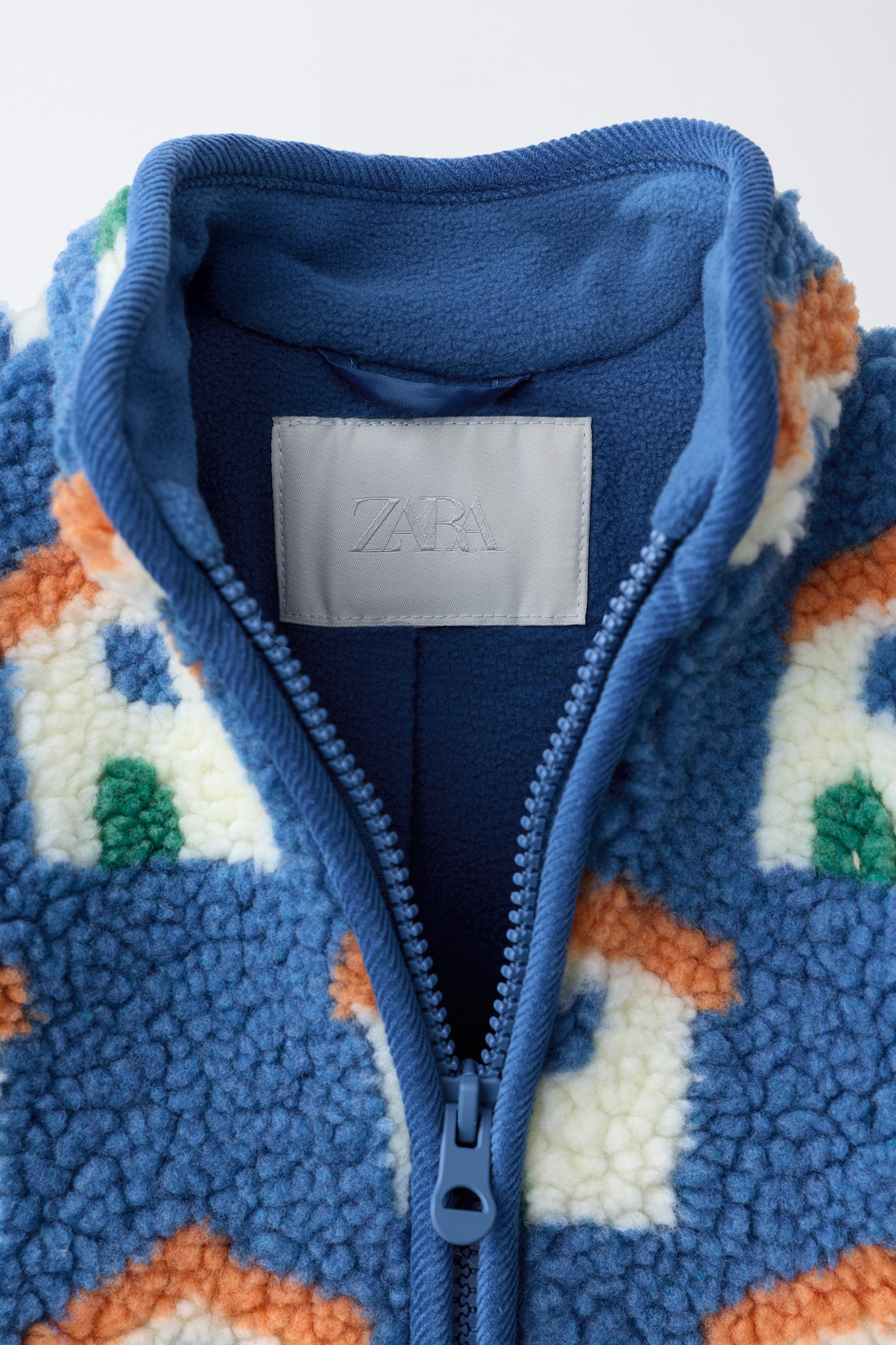 BLOUSON EFFET MOUTON IMPRIMÉ MAISONS