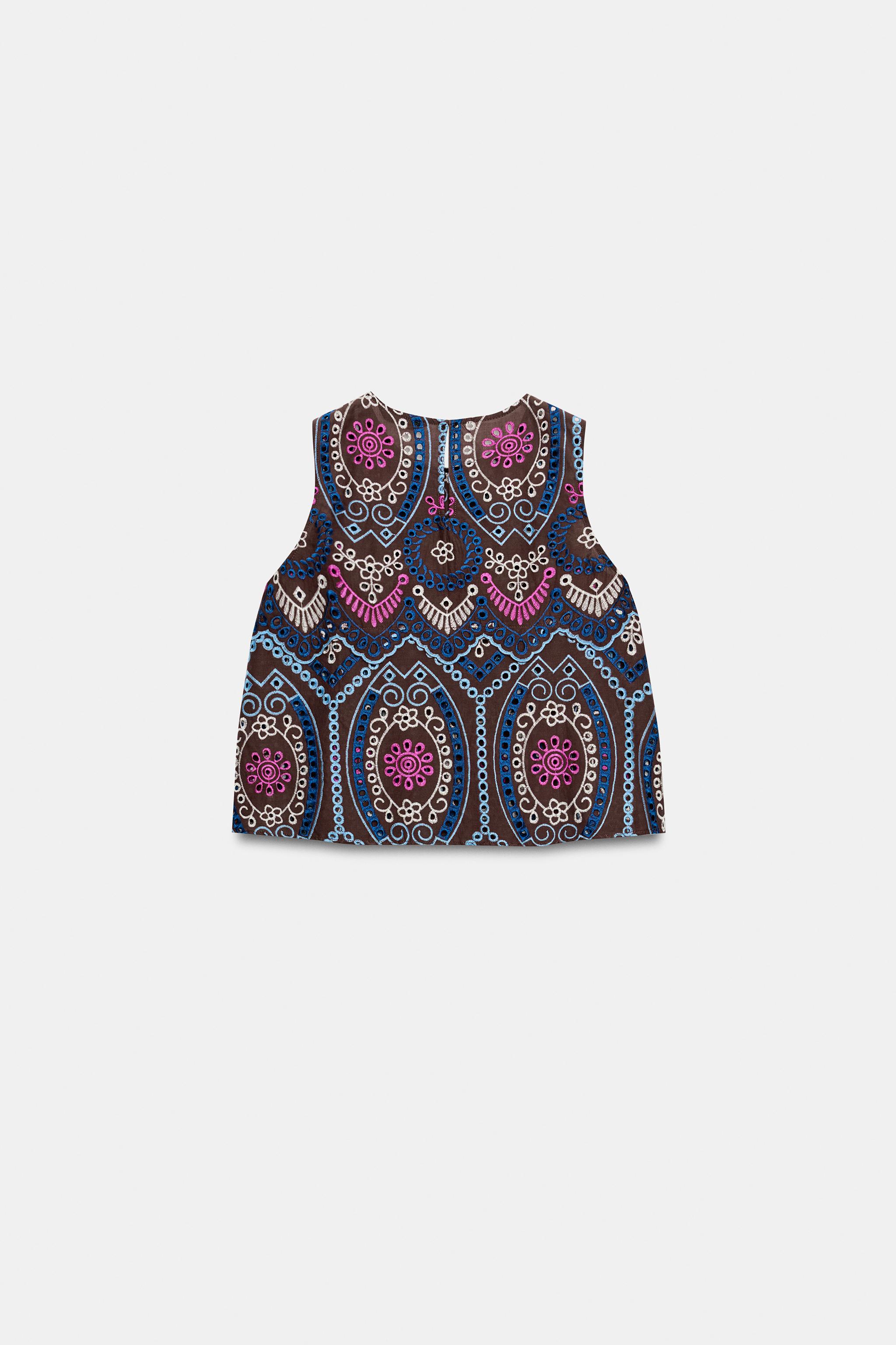 EMBROIDERED EYELET TOP