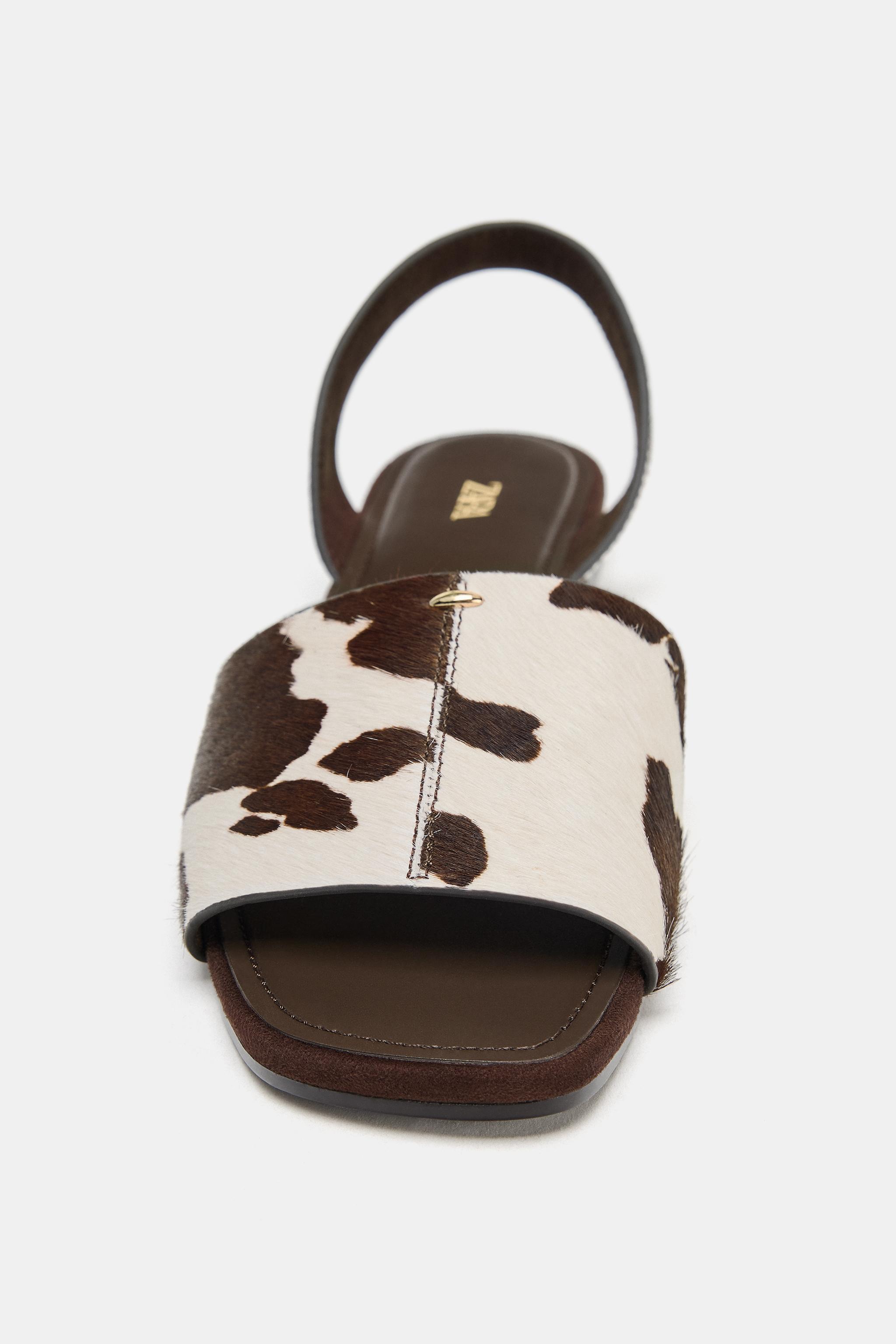 SANDALES PLATES EN CUIR EFFET FOURRURE