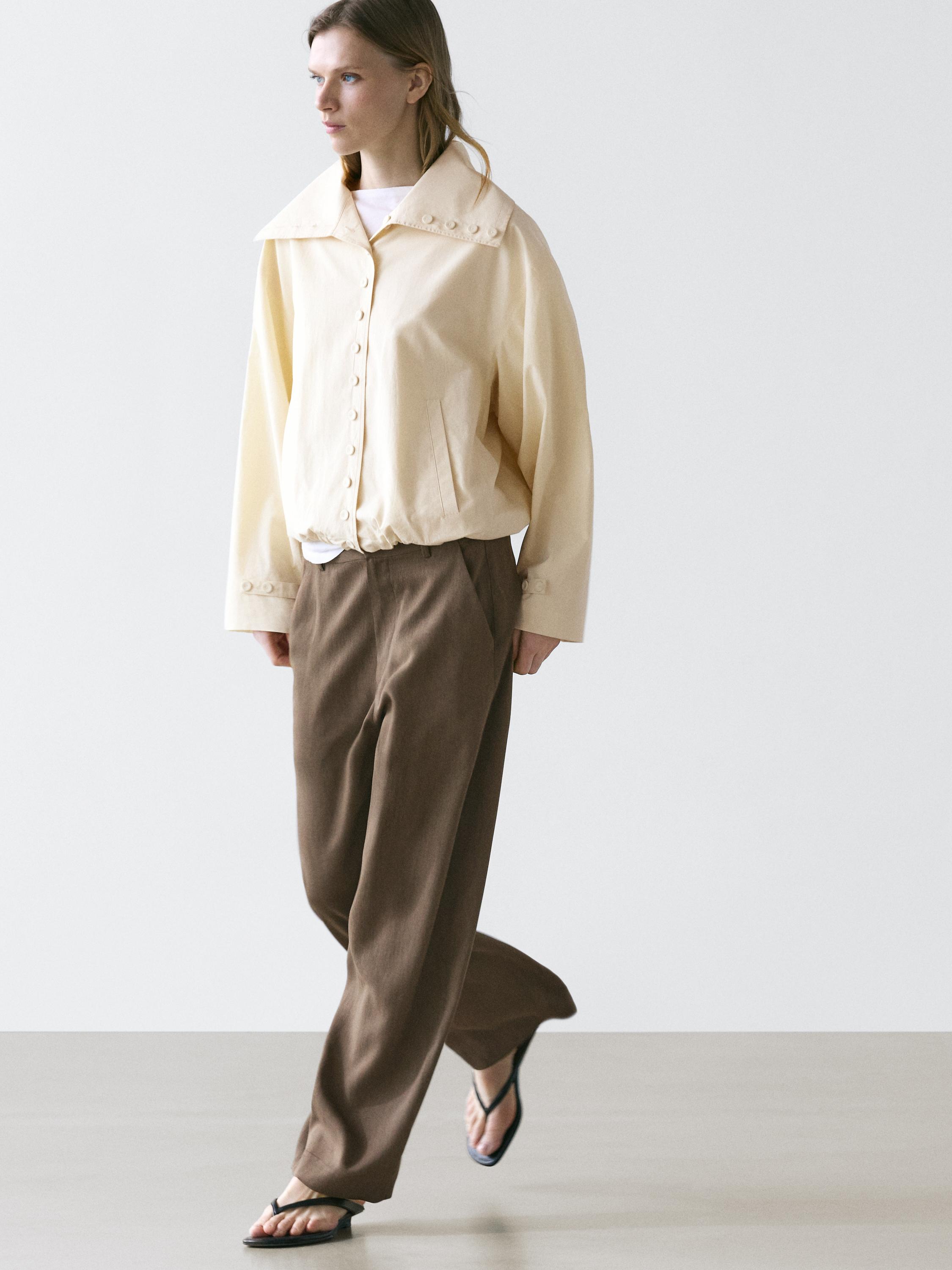 Flowing trousers with elasticated waistband