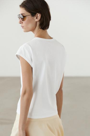 Camiseta sin mangas 100% algodón - Blanco roto de Zara
