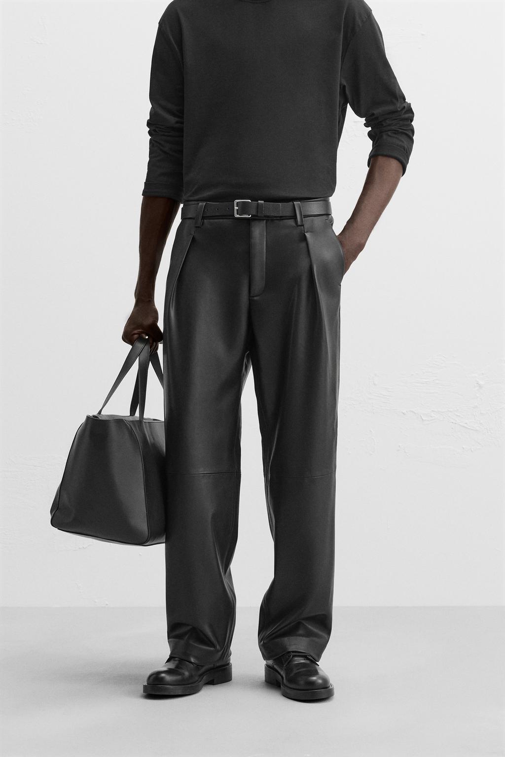 PLEATED FAUX LEATHER TROUSERS