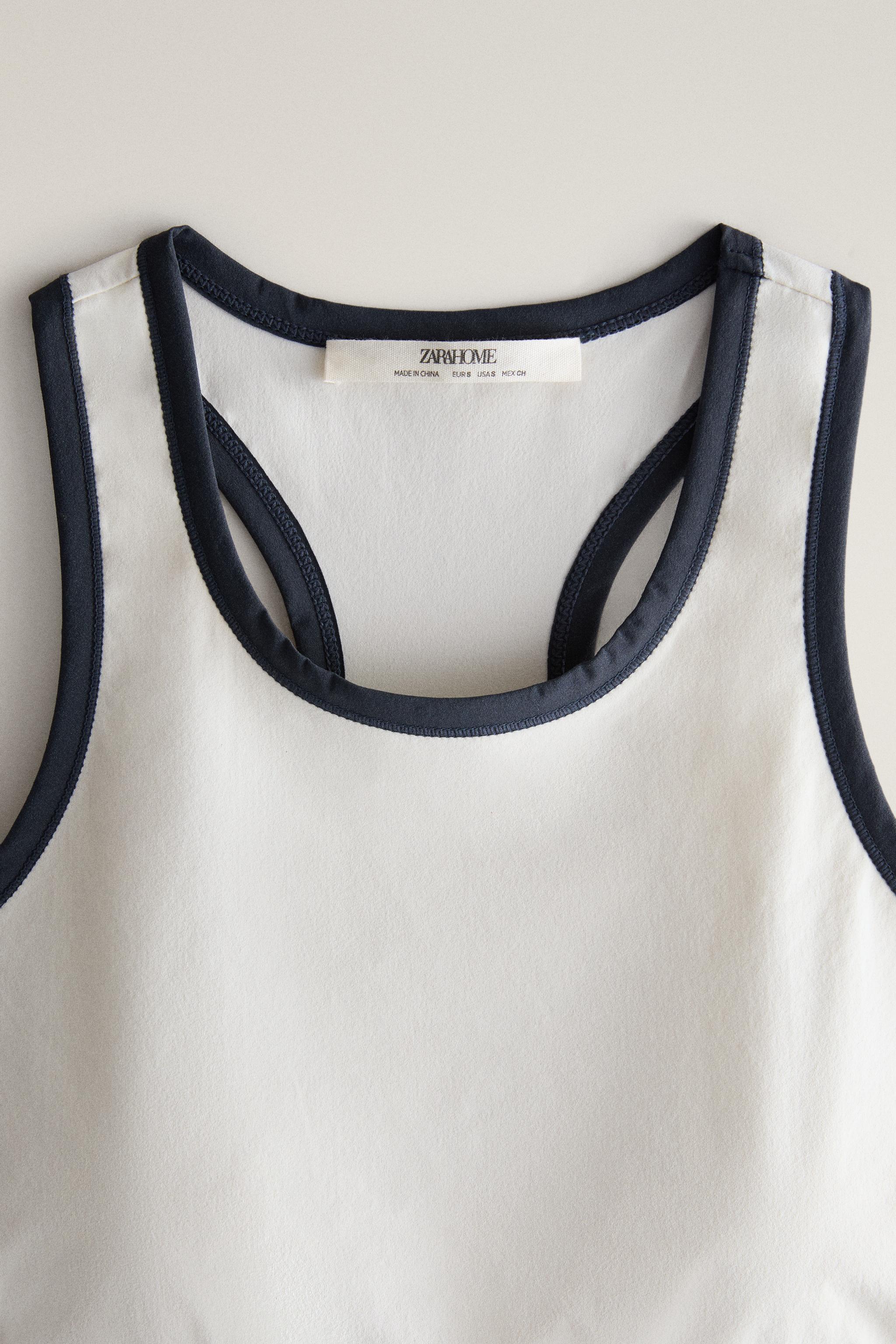 CONTRAST PIPING SPORTS TOP