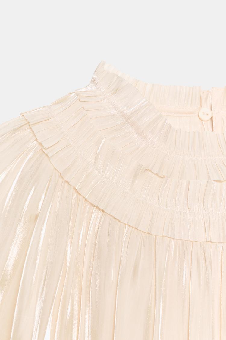 Blusa con efecto brillo 7