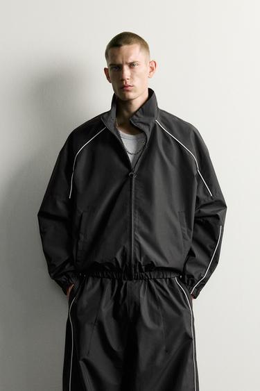 FUNKTIONSJACKE MIT KONTRASTDETAILS WATER REPELLENT - Schwarz von Zara