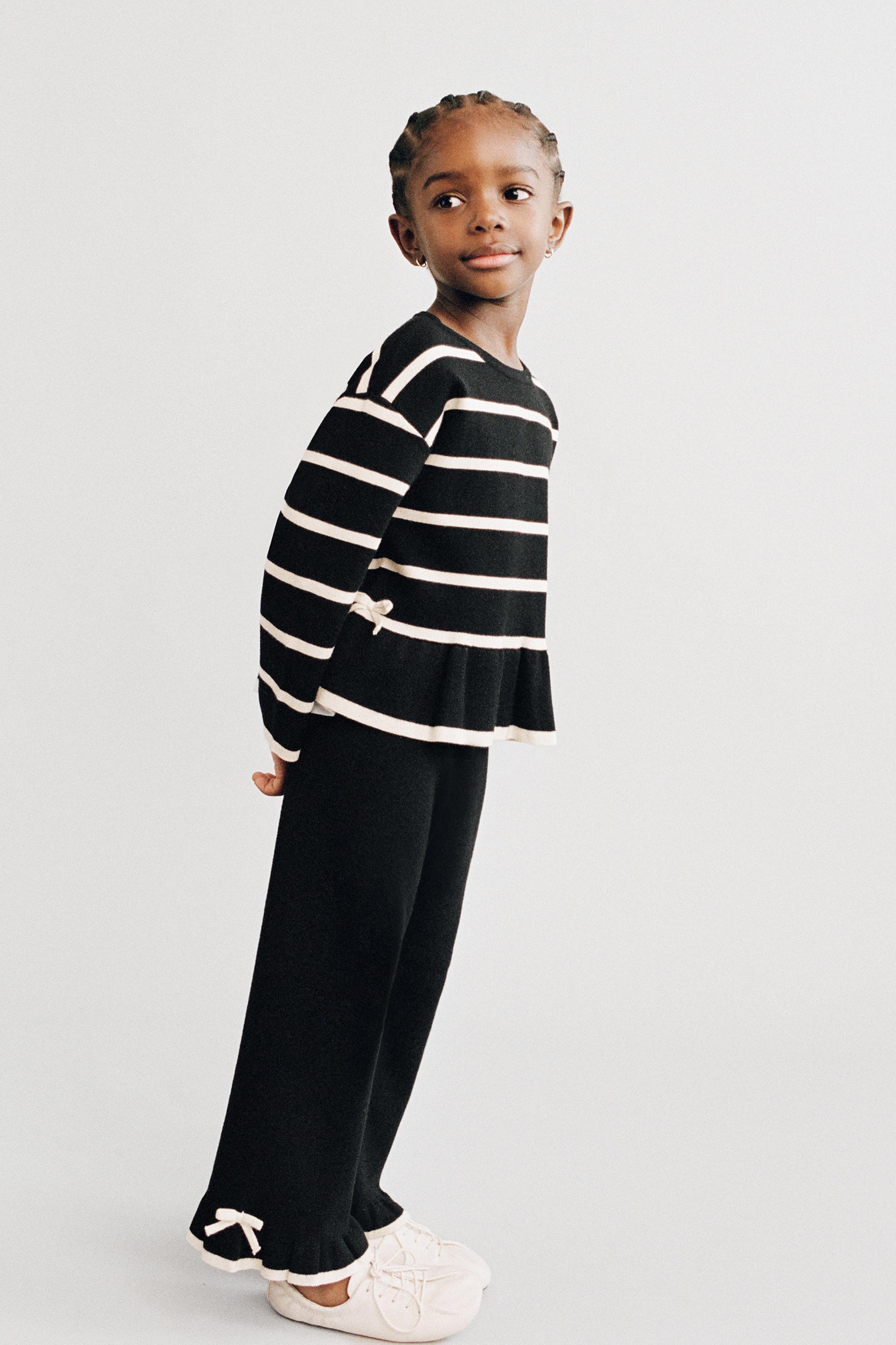 STRIPED KNIT JUMPER WITH BOWS — Black