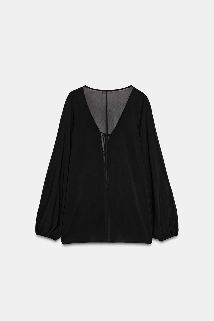 Top de crepé con mangas abullonadas 7
