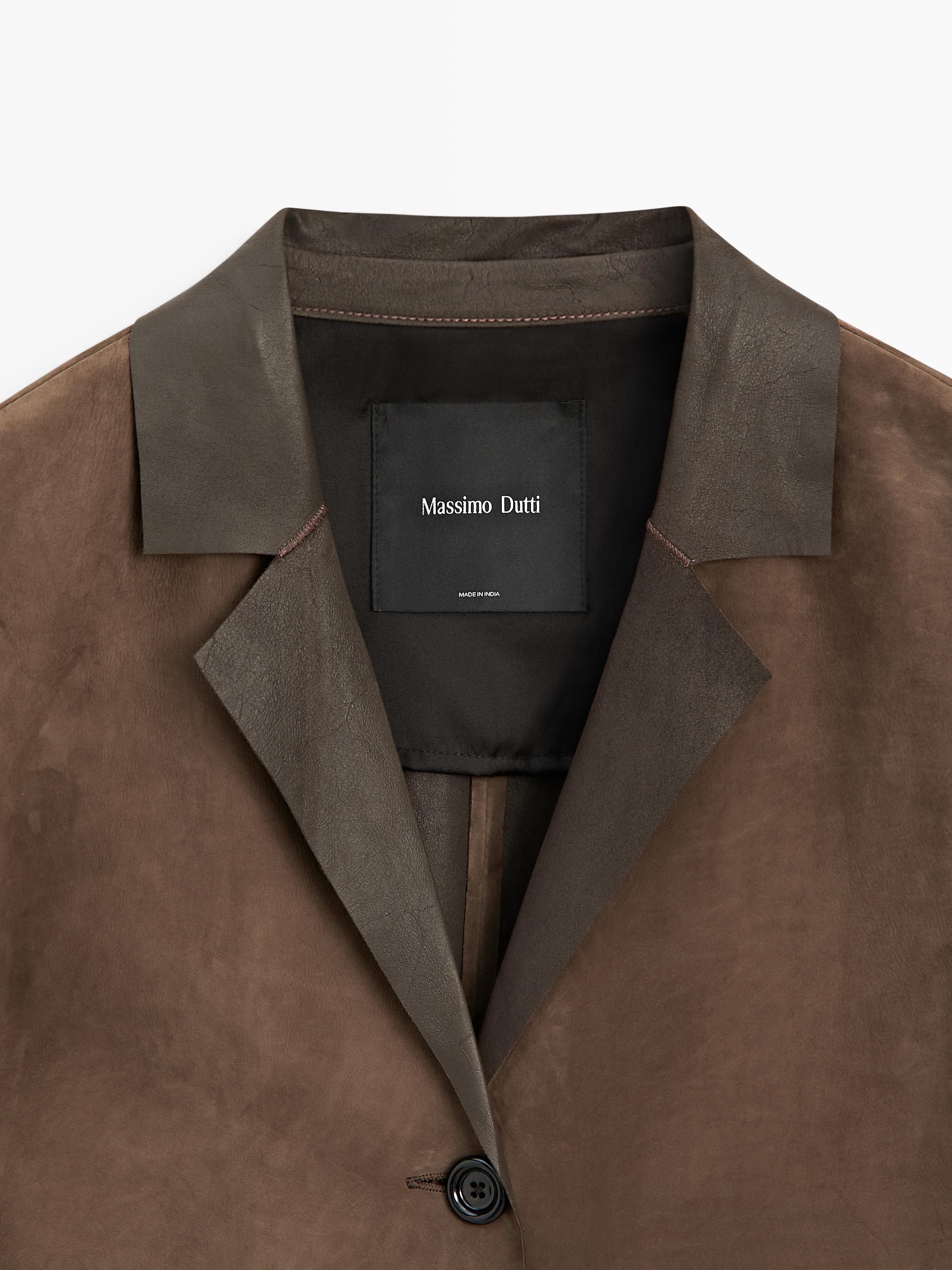 Manteau long en cuir finition daim