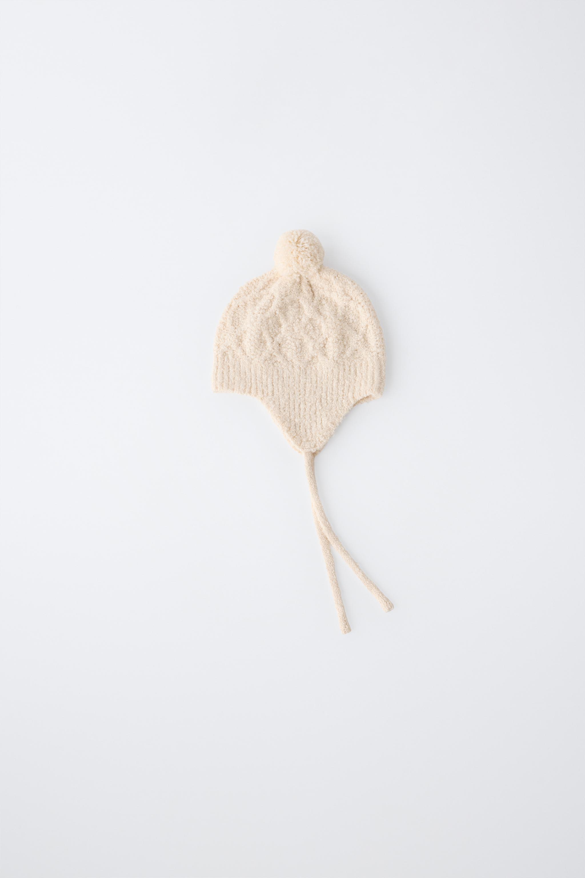 GORRO OREJERAS PUNTO OCHOS POMPÓN