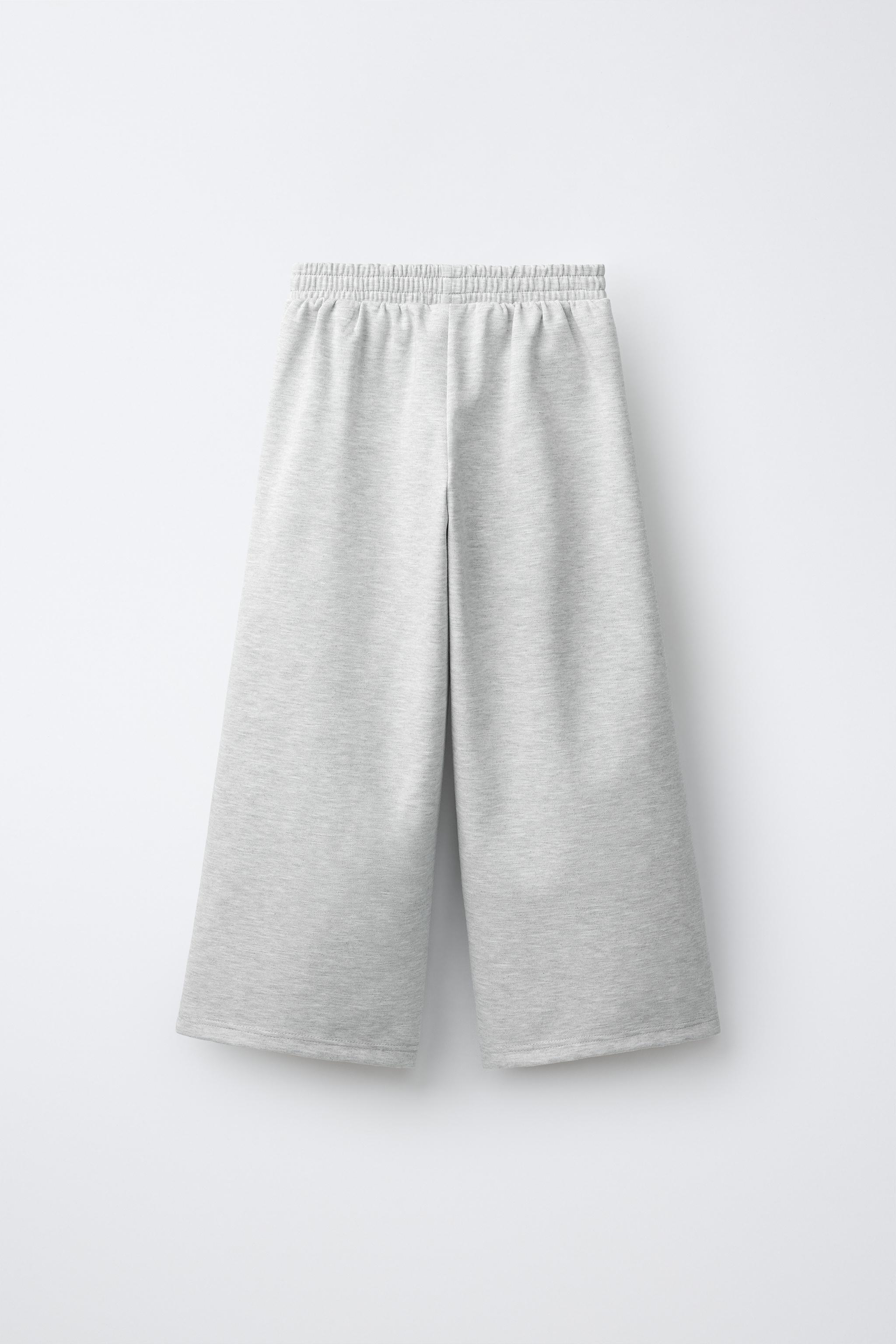 INTERLOCK PLEATED WIDE-LEG PANTS