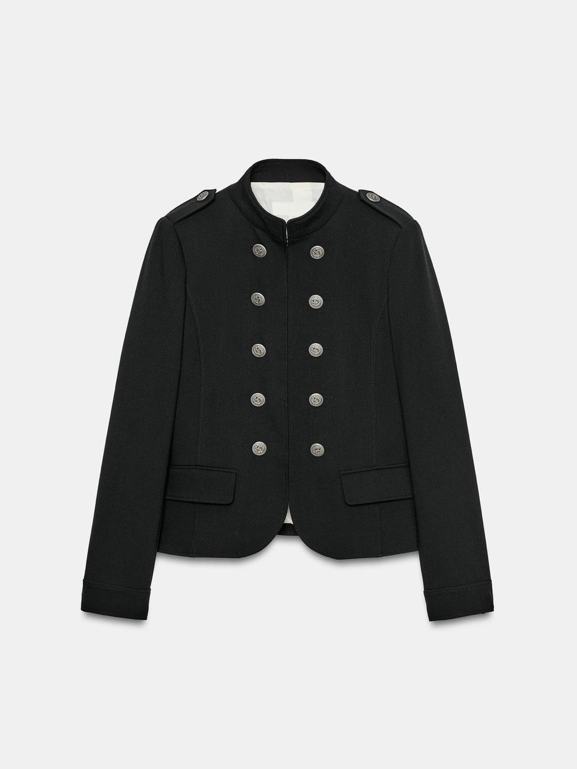 Black military-style jacket with a stand-up collar, epaulettes, double-breasted silver buttons and flap pockets against a light background.