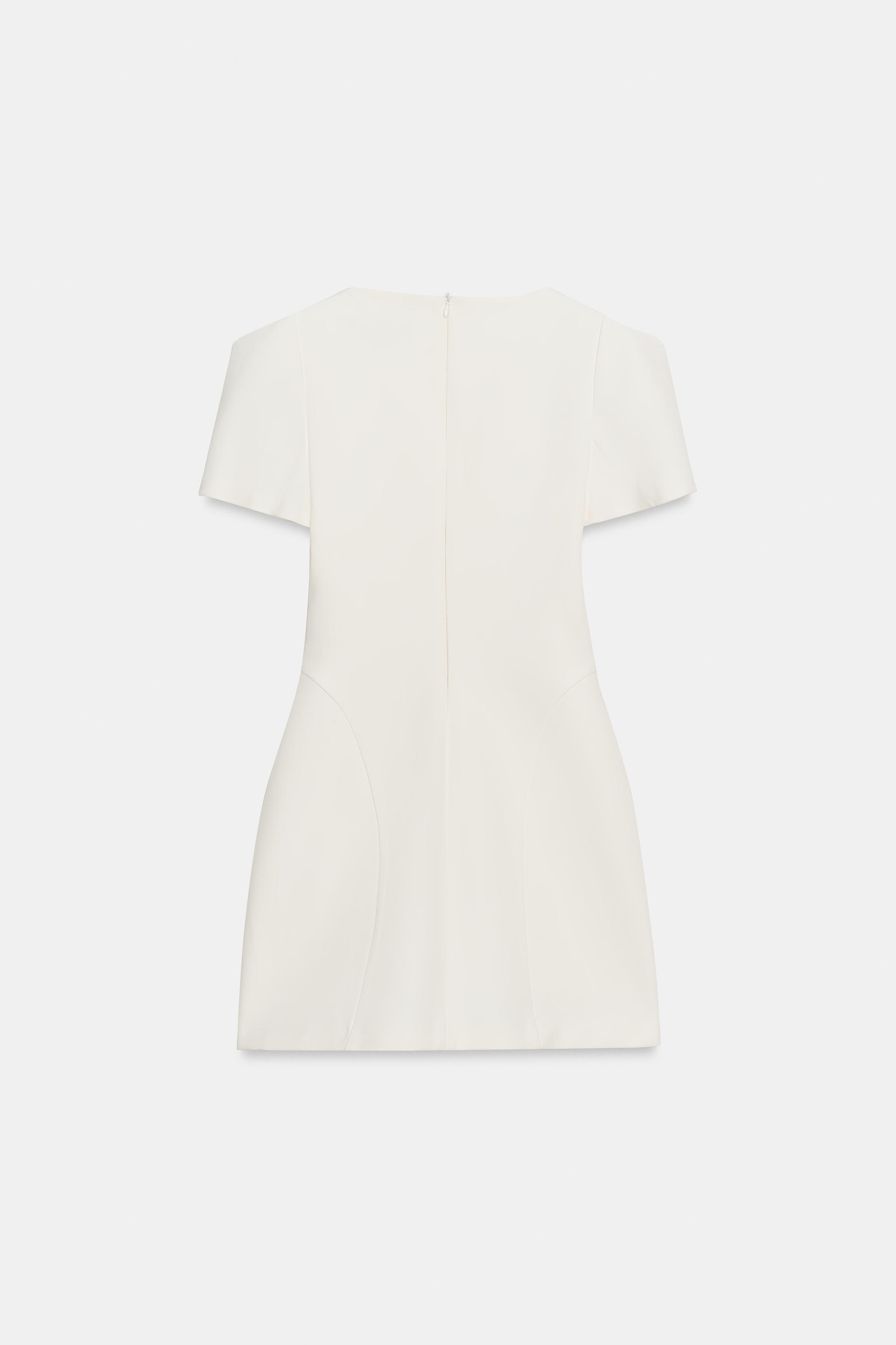 ROBE COURTE À MANCHES PLISSÉES