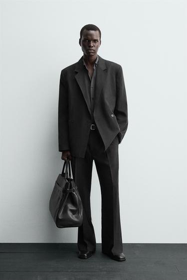 PANTALÓN FLUIDO TRAJE - Negro de Zara - Imagen 0