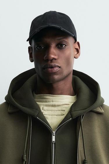 جاكيت بقصة بوكسي بمظهر نيوبرين - زيتوني الخاص بـ Zara