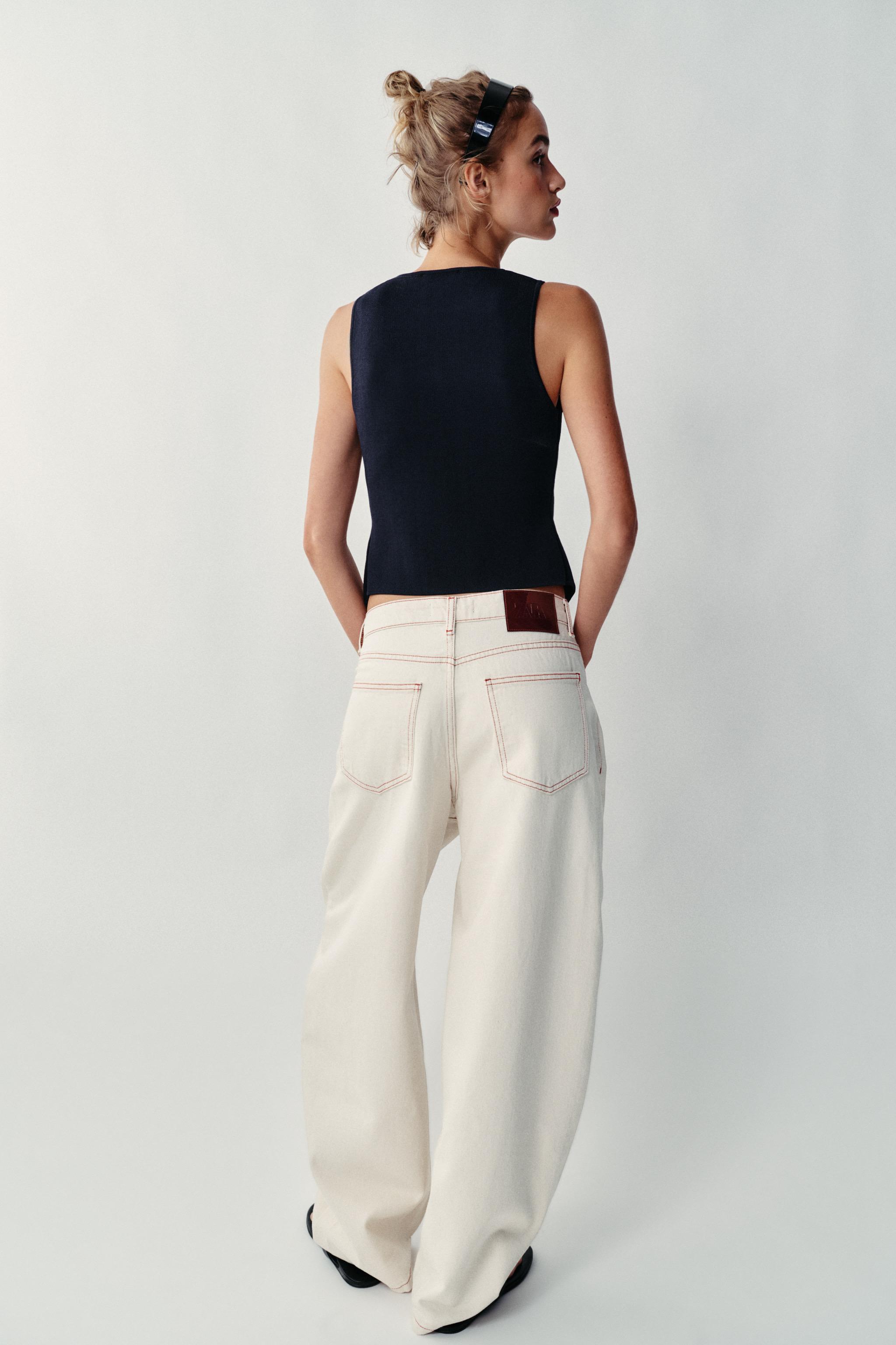 TOP EN MAILLE À FERMETURE ASYMÉTRIQUE
