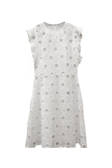 Front view of a white sleeveless dress with floral lace.