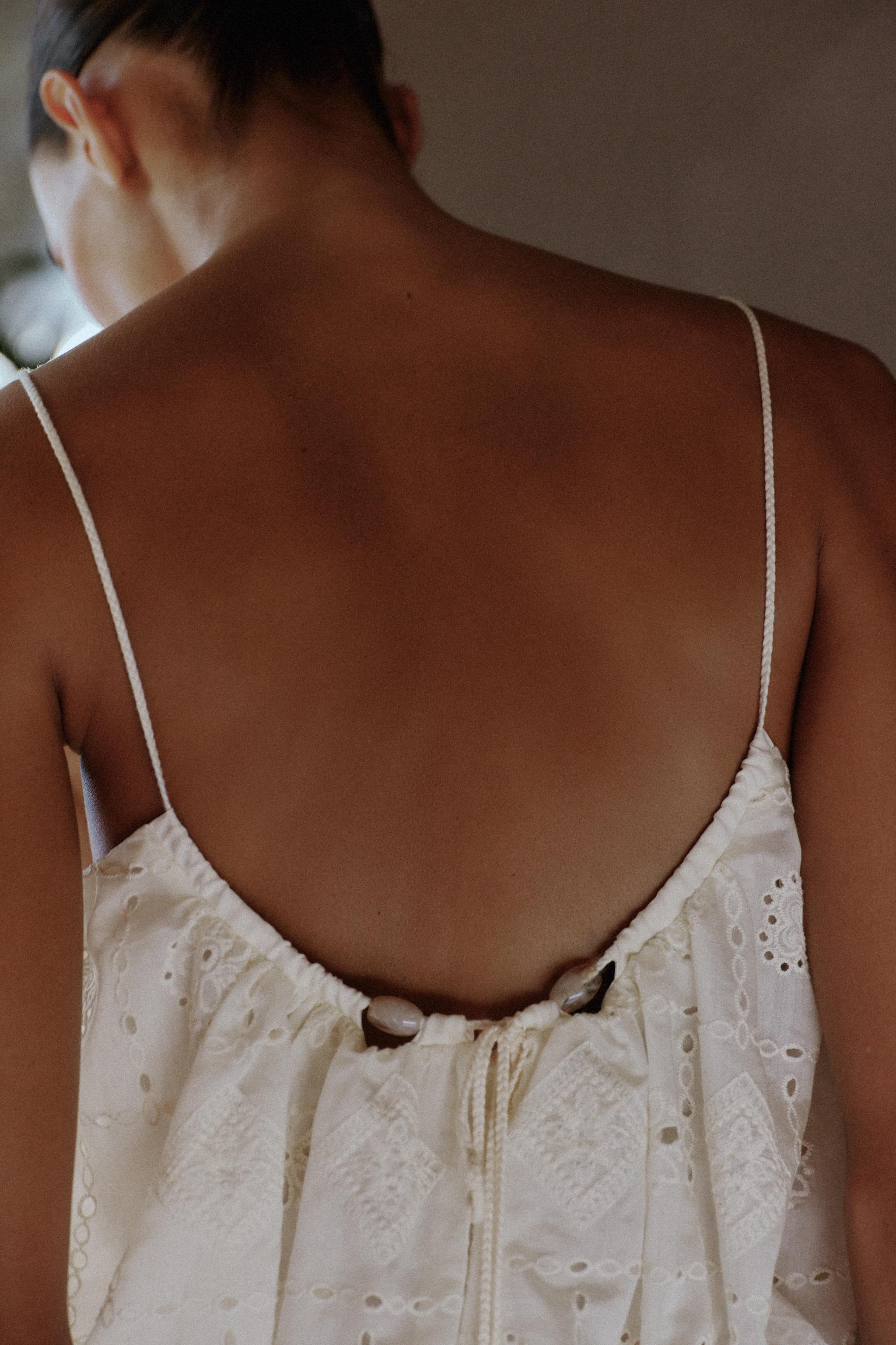 PUFFBALL TOP WITH CUTWORK EMBROIDERY