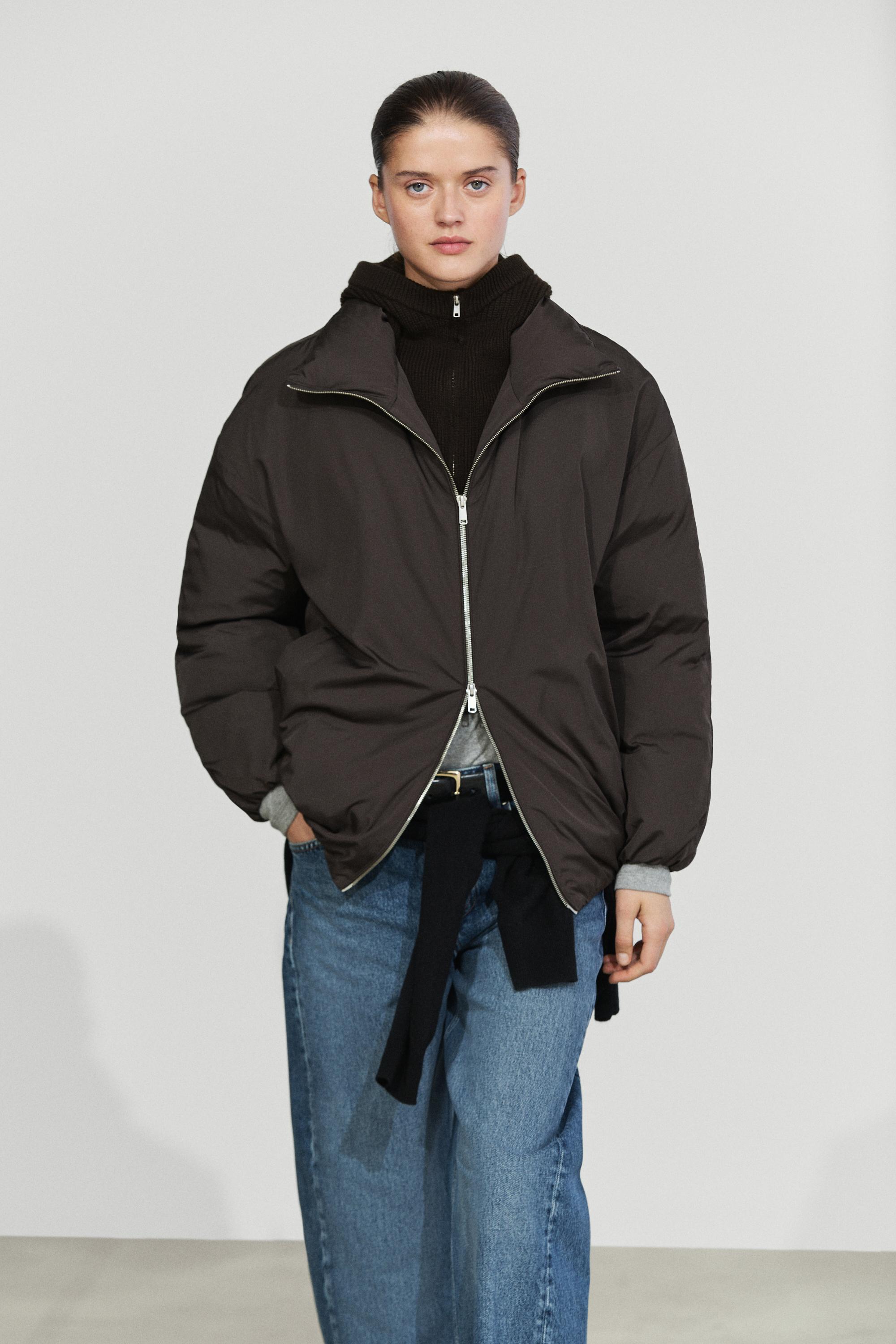 Down jacket with detachable detail piece