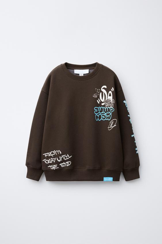 SUDADERA GRAFFITI ETIQUETA - Marrón de Zara - Imagen 0