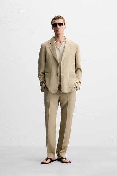 PANTALÓN LAVADO TRAJE - Beige de Zara - Imagen 0