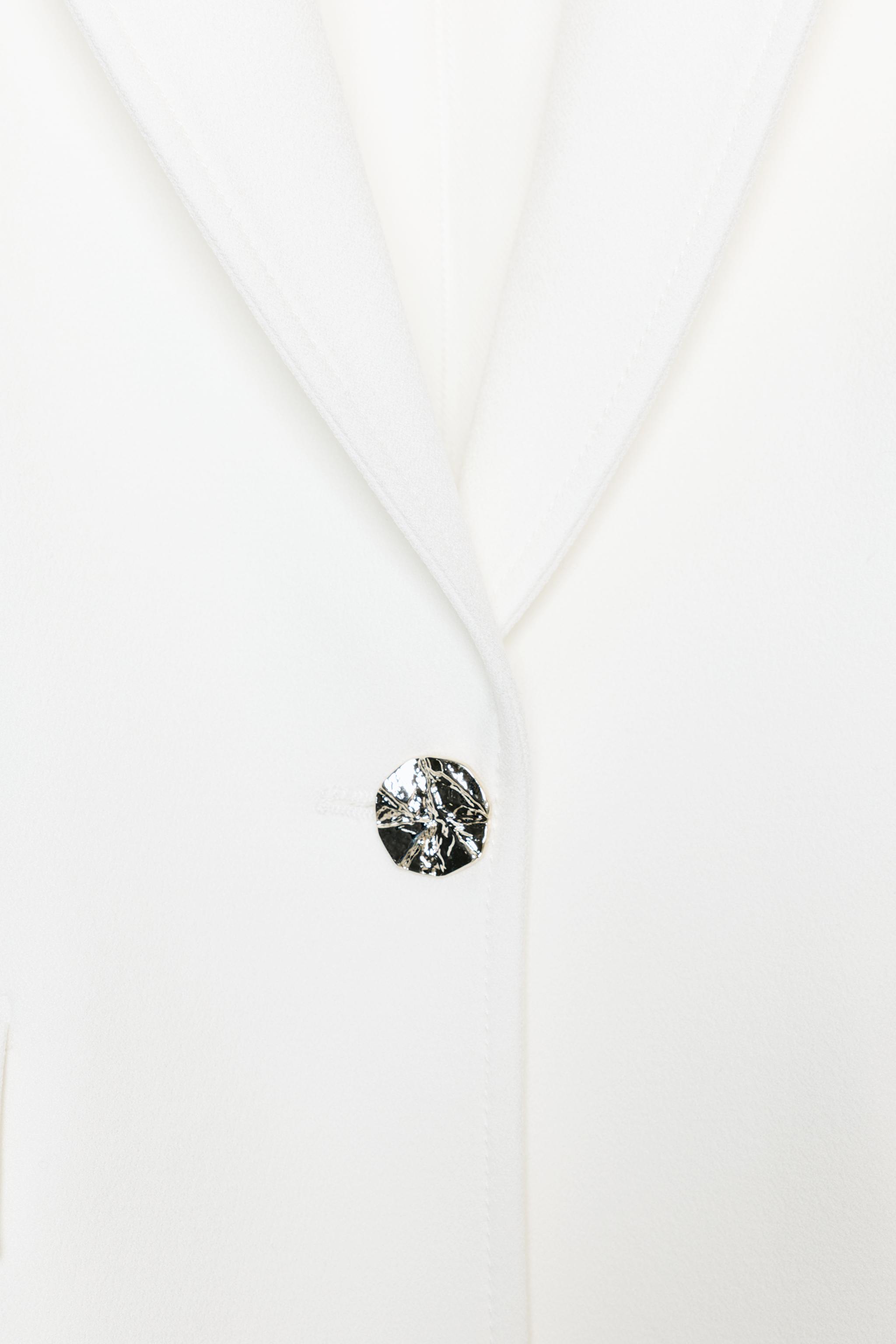 VESTE AJUSTÉE ÉPAULES MARQUÉES