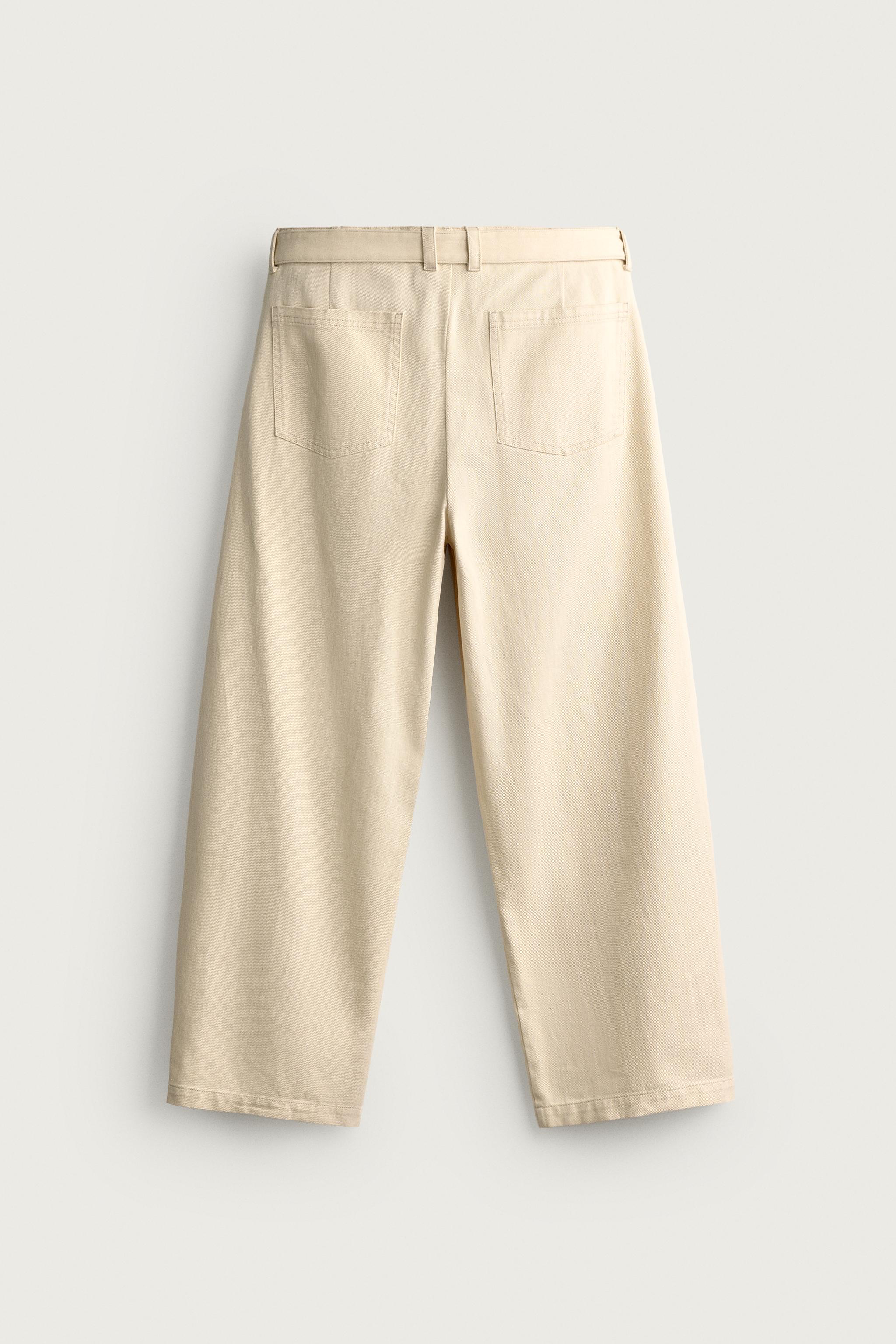 BELTED PLEATED RELAXED FIT PANTS